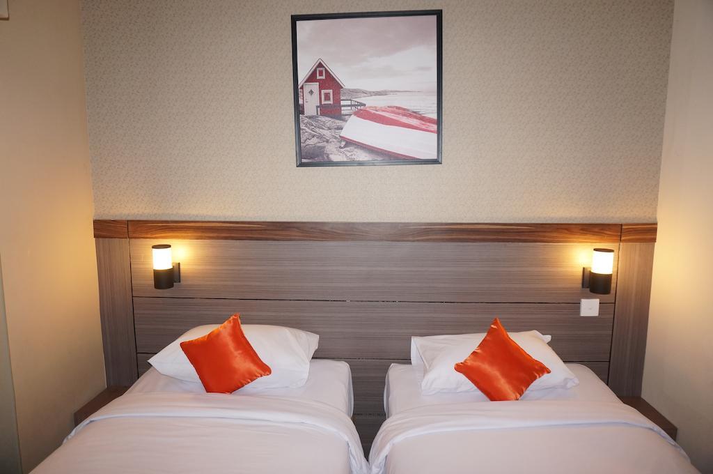 Ekon Hotel Yogyakarta Rum bild